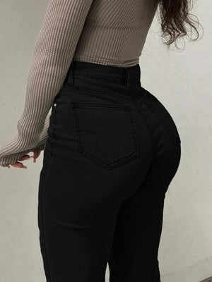 Black denim maternity jeans with pockets and a sculpted flare leg.