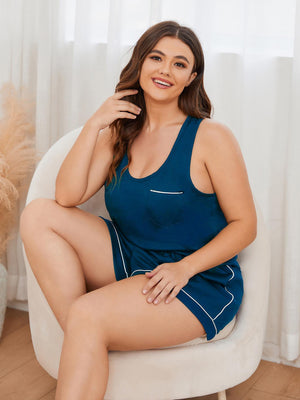 Peacock blue loungewear set with contrast trim, racerback tank and shorts.