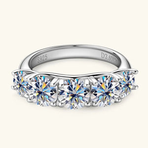 Silver band ring with five round moissanite stones and S925 engraving.