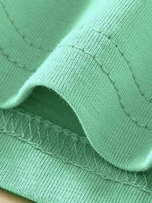 Toddler green cotton crew-neck tee with visible stitching detail