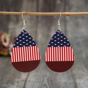 Patriotic faux leather teardrop earrings with American flag print in deep red.