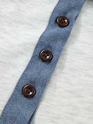 Light grey cotton casual top with denim placket and brown buttons.
