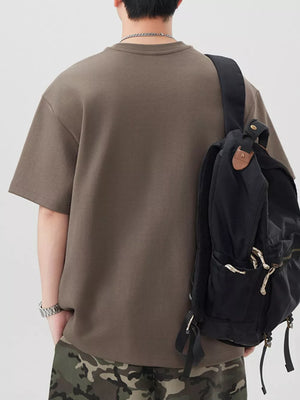 Oversized brown cotton blend men's t-shirt with crew neck and short sleeves.