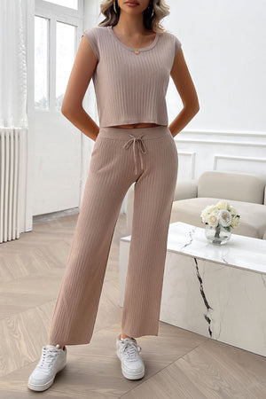Taupe ribbed knit cropped lounge set with cap sleeves and wide-leg pants with drawstring waist.