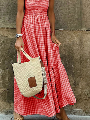 Red gingham ruffled sleeve maxi dress with smocked bodice and tiered skirt.