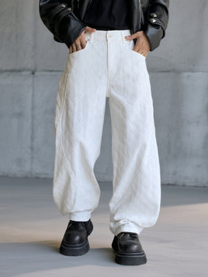 White textured cotton wide-leg jeans for men with curved seams.