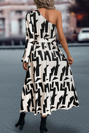 Geometric print asymmetric maxi dress with belt in black and white.