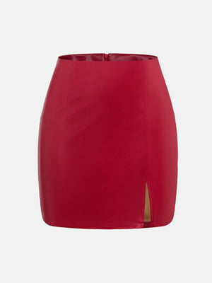Leatherette mini skirt in deep red with a side slit.