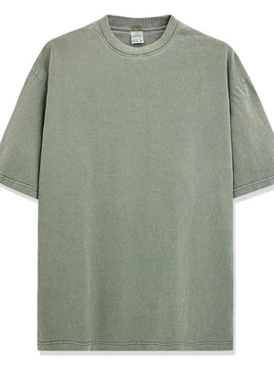 Oversized pigment-dyed crewneck tee in Matcha Green with a relaxed fit and crew neckline.