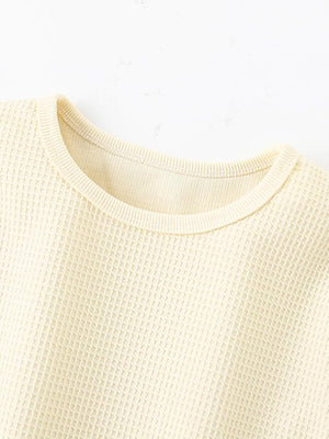 Beige waffle knit toddler tee with crew neck and ribbed trim