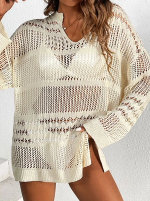 Open-knit beige beach cover-up with V-neck, long sleeves, and slit hem.