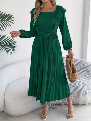 Green ruffled A-line midi dress with long sleeves, square neckline, and pleated skirt.