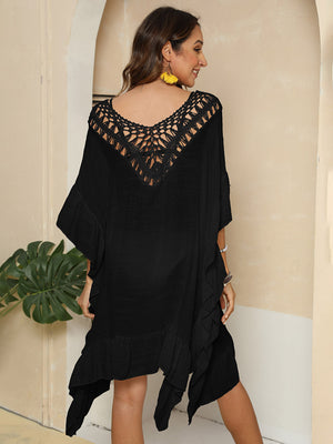 Black crochet yoke ruffle hem cover-up with V-neck and short sleeves.