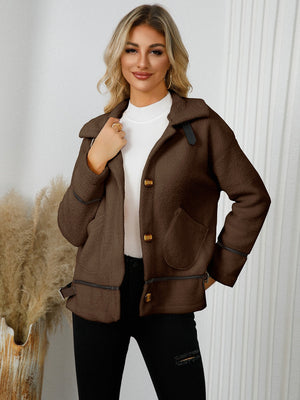 Chocolate teddy textured jacket with leatherette trim, button front, and pocket details.