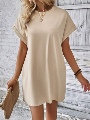 Relaxed tee dress in tan with cuffed short sleeves and a crew neck.