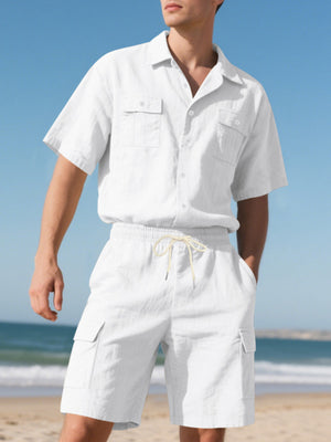 White relaxed-fit button-up shirt with two chest pockets and drawstring cargo shorts.