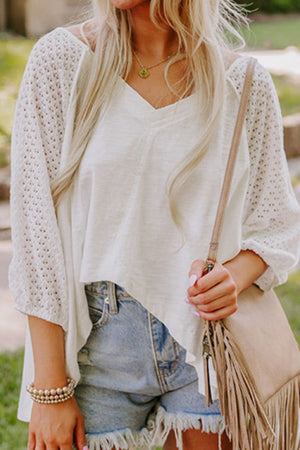 White lace-inset dolman sleeve blouse with V-neck and relaxed fit