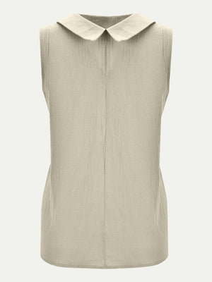 Sleeveless beige blouse with Peter Pan collar and textured fabric