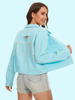 Aqua distressed denim trucker jacket with crystal fringe detail and back rips.