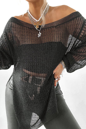 Black off-shoulder metallic knit top with sheer detail and side slits.