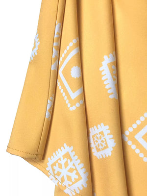 Yellow midi dress with geometric print, 3/4 sleeves, and notched neckline detail.