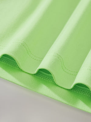 Bright green toddler t-shirt hem detail with double stitching.