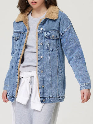 Light wash acid wash denim trucker jacket with sherpa collar and lining.
