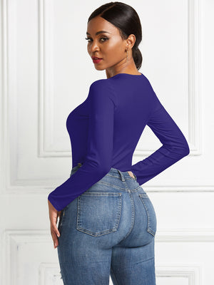 Deep Purple long sleeve ribbed jersey bodysuit with a crew neck, styled with denim jeans.
