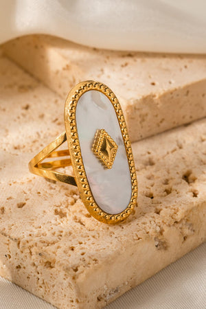 Oval mother of pearl ring with gold-plated diamond accent and beaded edge