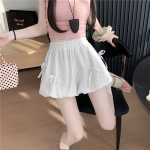 White bubble skirt with bowknot details and high waist