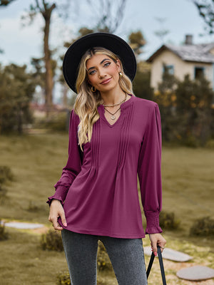 Plum pleated yoke and shirred cuff long sleeve blouse with V-neck