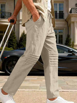 Men's Khaki linen-blend drawstring sweatpants with pleated knee detail.