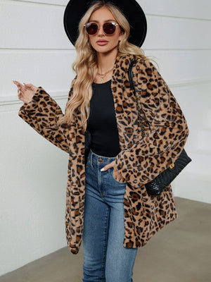 Leopard print faux fur cocoon coat with open front and relaxed fit.
