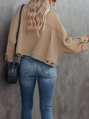 Waffle knit cropped utility jacket in camel with button details and frayed hem.