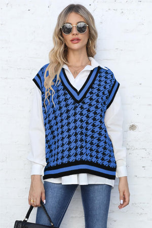 Blue houndstooth knit v-neck vest with black trim, acrylic.