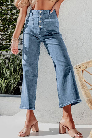 Light blue denim button-front cropped wide-leg jeans with utility pockets.