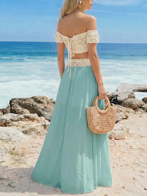 Crochet bandeau top and pastel blue maxi skirt set with lace trim detail.