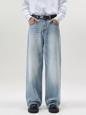 Men's wide-leg light blue wash denim jeans with a relaxed fit.