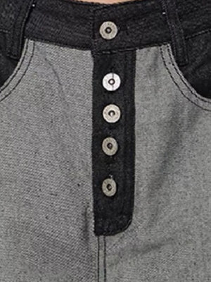 Men's grey and black cotton jeans with button fly and contrast stitching.