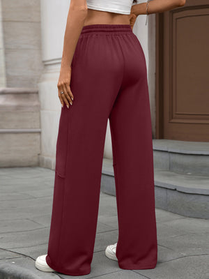 High-waist drawstring wide-leg pants in wine red with a relaxed fit.