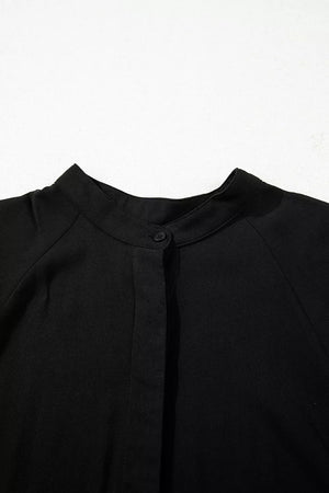 Black maternity maxi dress with mandarin collar and hidden placket detail.