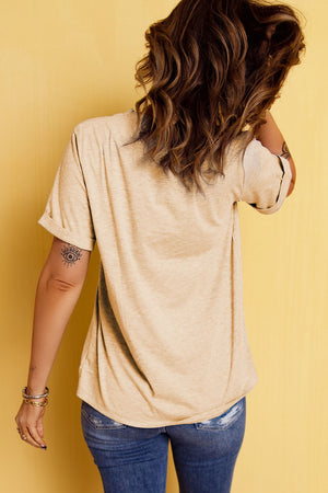 Sand graphic crop tee with rolled sleeves and a relaxed fit.