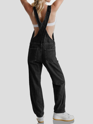 Black denim overalls with cross-back straps and relaxed fit, shown from the back.