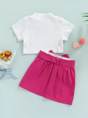 Baby girls' ribbed knit crop top and pink skirt set with bow detail