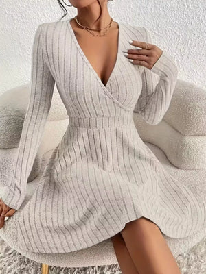 Light Gray ribbed wrap mini dress with long sleeves and a V-neck.