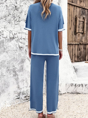 Dusty Blue knit co-ord set with contrast white trim on short sleeves and wide-leg pants.