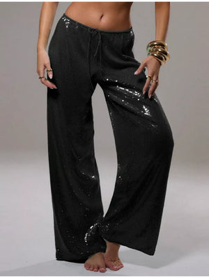 Black sequin wide leg pants with drawstring waist and cotton blend.