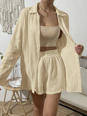 Textured gauze shirt and shorts set in ivory, with a buttoned shirt and elastic waist shorts.