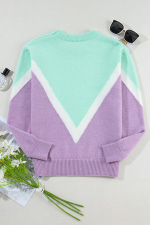 Chevron colorblock knit pullover sweater in lavender and mint green with white accents.