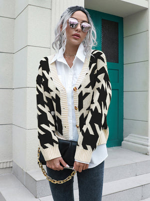Geometric houndstooth V-neck cardigan in acrylic with button front.